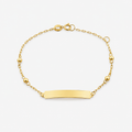 Gold bracelet with a bar clasp on a white background