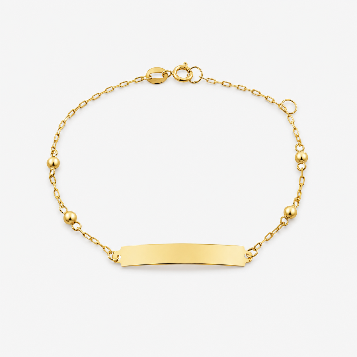 Gold bracelet with a bar clasp on a white background