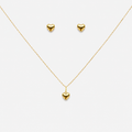 Gold heart necklace and earrings on a white background