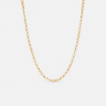 Gold chain necklace on a light gray background