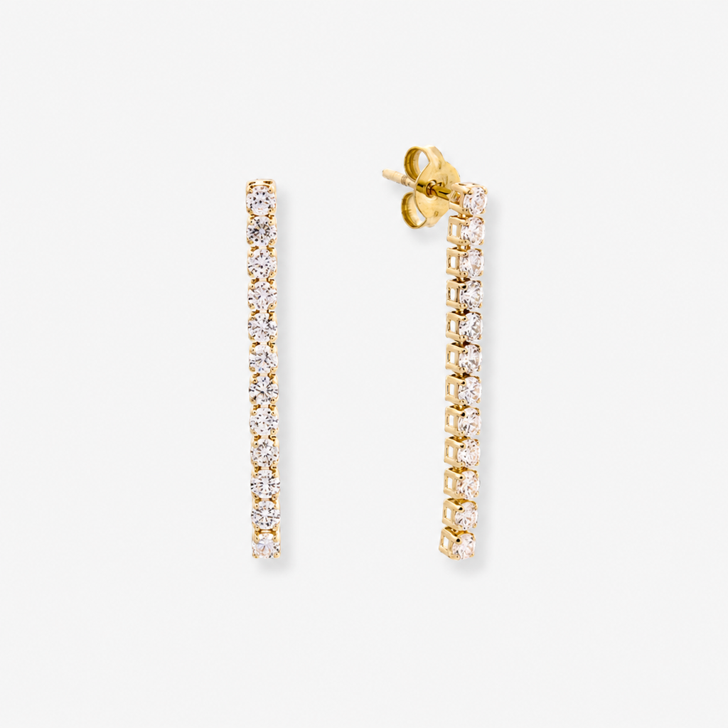Gold and diamond earrings on a white background