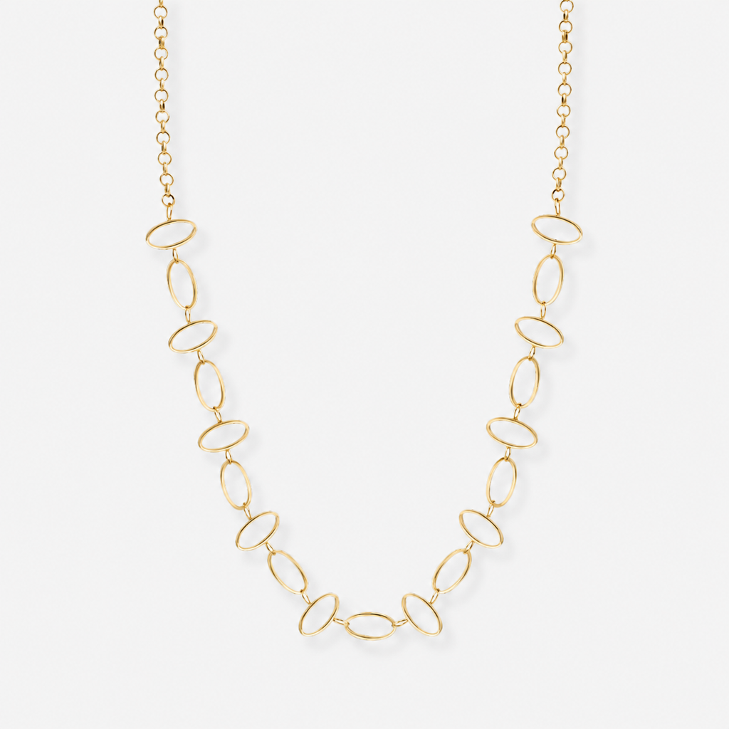 Gold necklace with oval links on a white background