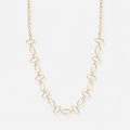 Gold necklace with oval links on a white background