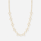 Gold necklace with oval links on a white background