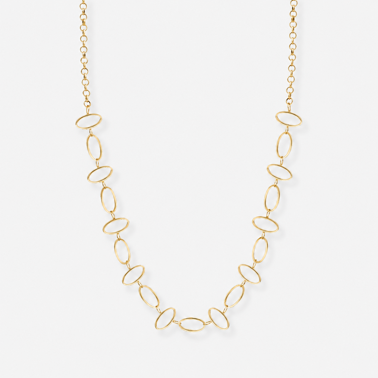 Gold necklace with oval links on a white background