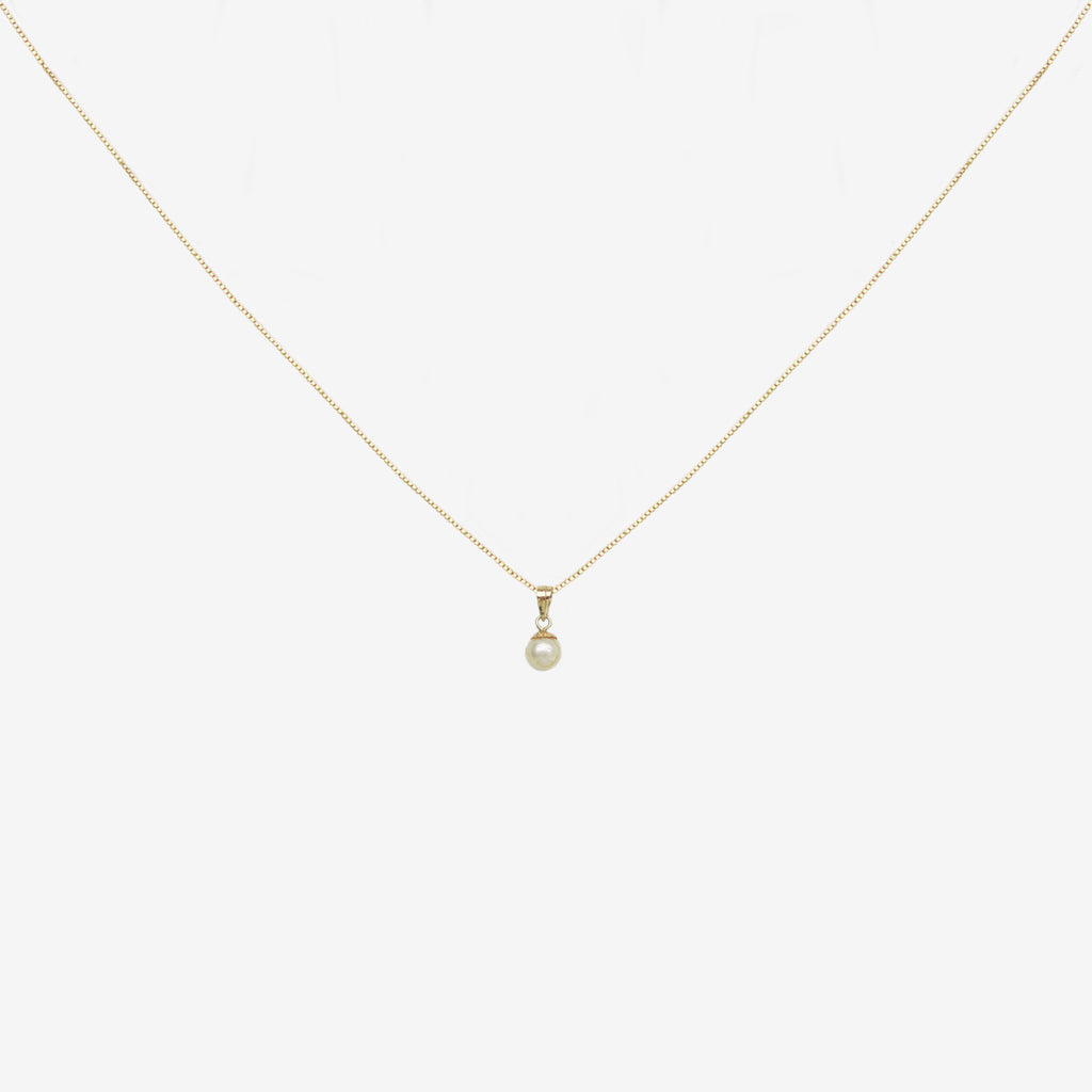 Colgante de perla natural en forma de gota en oro amarillo de 18 quilates