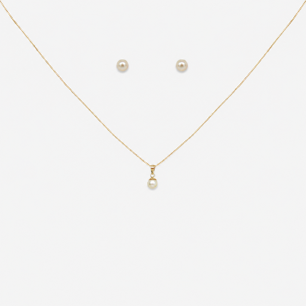 Pearl necklace and earrings on a white background