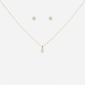 Pearl necklace and earrings on a white background