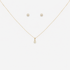 Pearl necklace and earrings on a white background