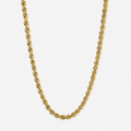 Gold chain necklace on a white background