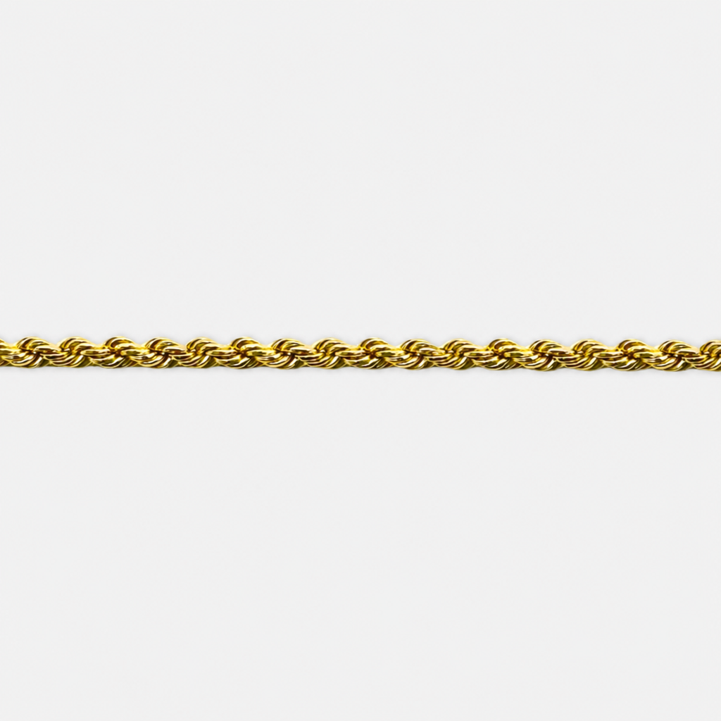 Gold rope chain on a white background