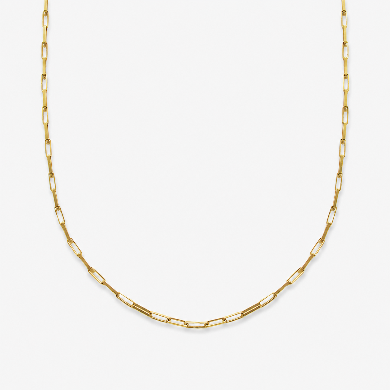 Gold chain necklace on a white background