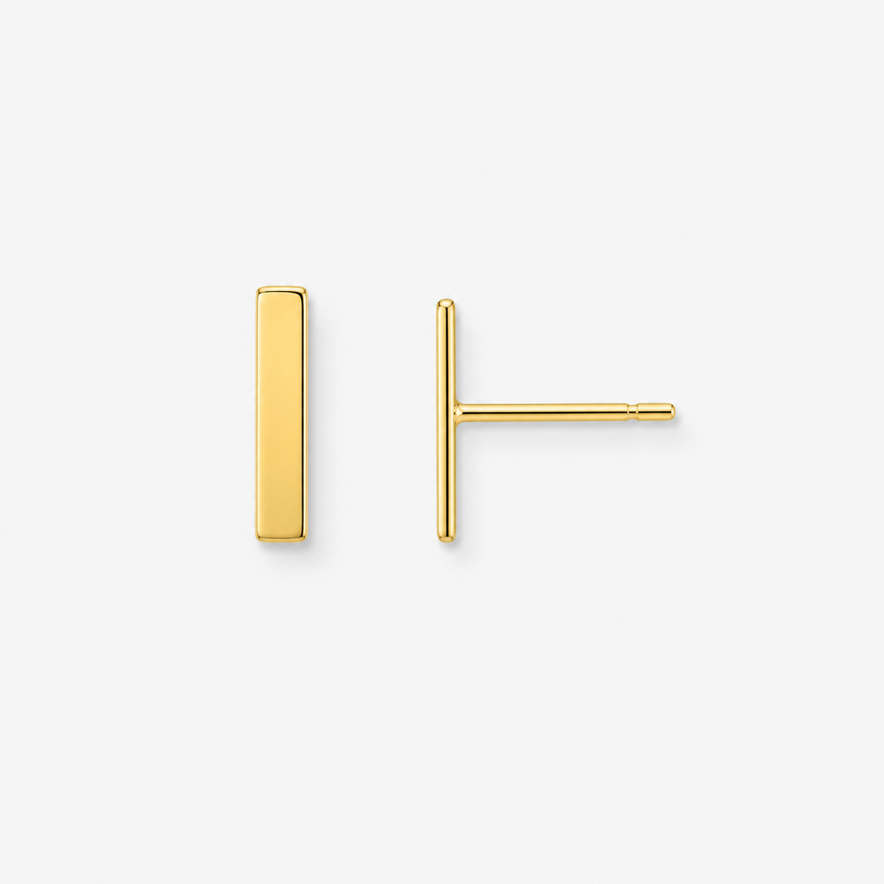 Gold bar earrings on a white background