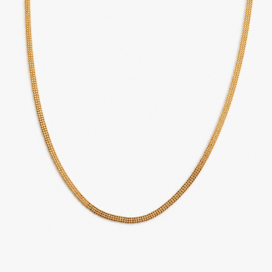Gold chain necklace on a white background